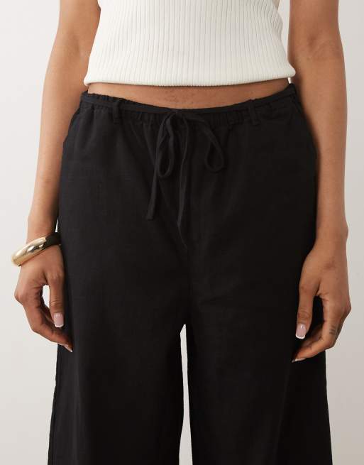 ASOS DESIGN Tall – Svarta byxor i linnestil och dra på-modell, 3 av 5