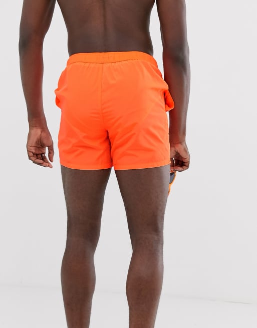 ASOS DESIGN tall swim shorts in neon orange ASOS