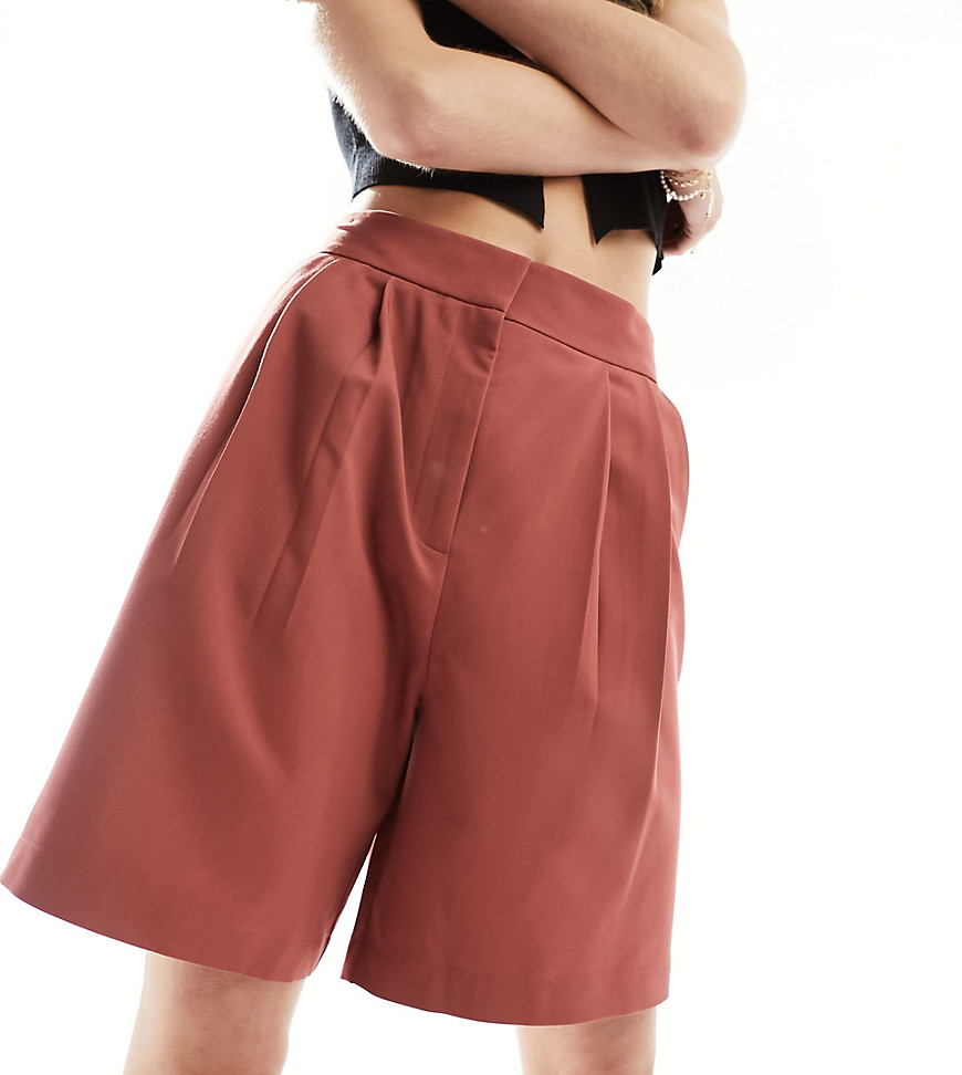 Asos Design Tall Tailored Longline Shorts In Rust In Red
