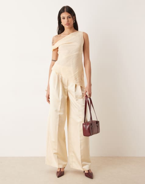 ASOS DESIGN Tall tailored satin pleat detail wide leg trousers in ivory 