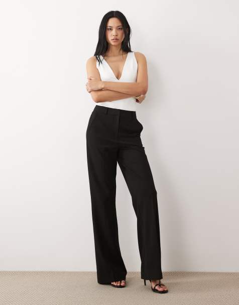 ASOS DESIGN Tall tailored snatch flare pants in black - view 1