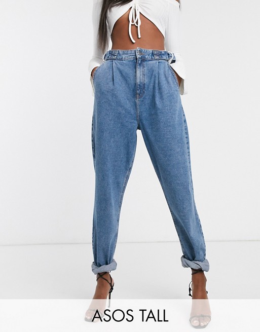 ASOS DESIGN Tall Tapered boyfriend jeans with D-ring waist detail with curved seams in mid blue