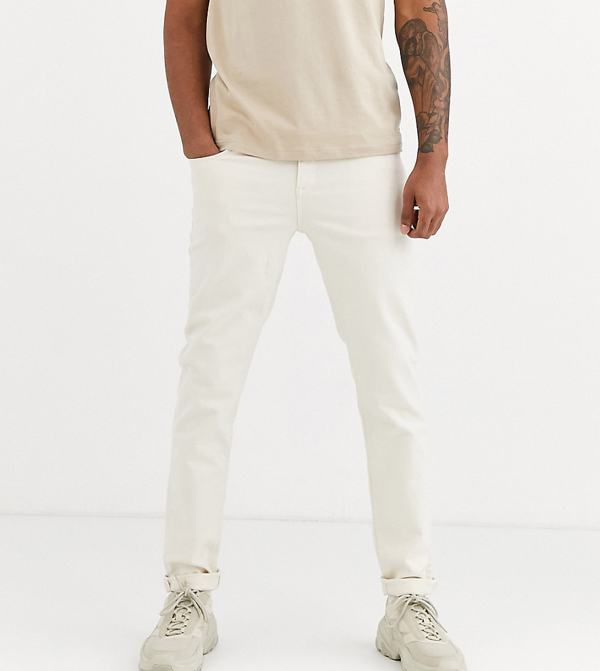 ASOS DESIGN Tall tapered jeans in ecru-White