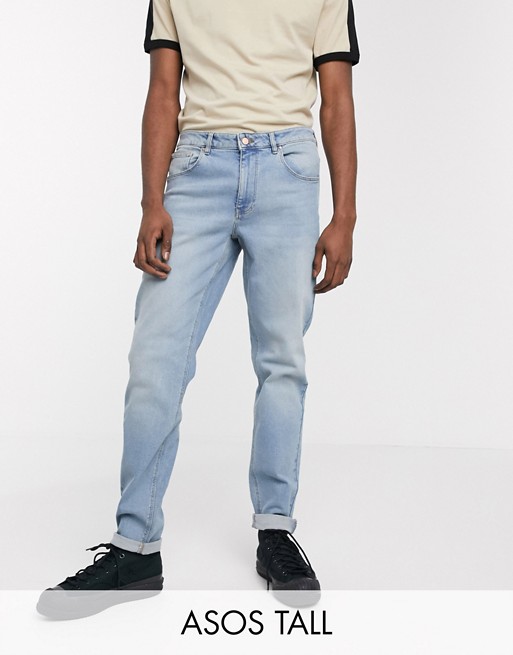 ASOS DESIGN Tall tapered jeans in light wash blue