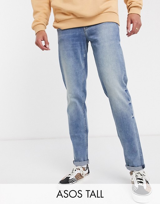 ASOS DESIGN Tall tapered jeans in mid wash blue
