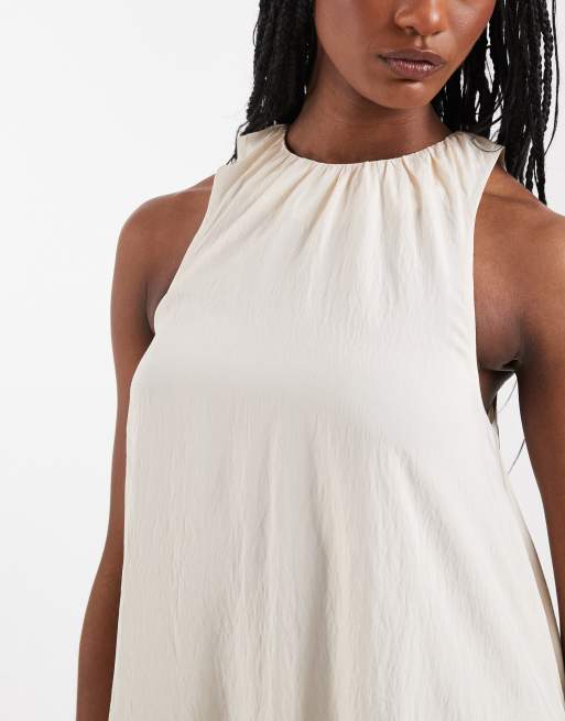 ASOS DESIGN Tall techy fabric asymmetric hem volume mini dress in stone, 3 of 4