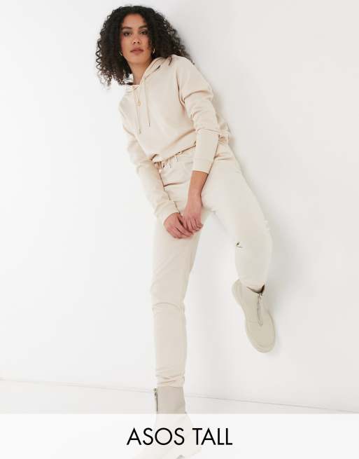 cream color tracksuit