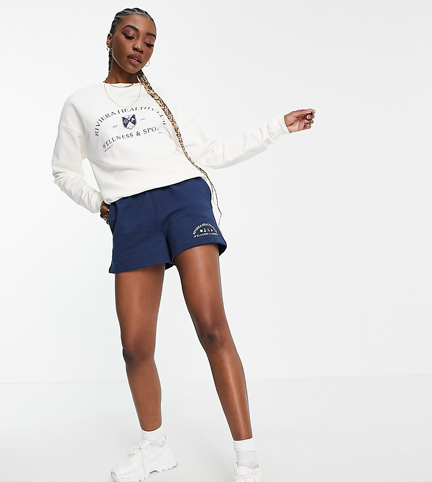 ASOS DESIGN Tall tracksuit sweat / roll waist sweat short with riviera graphic in navy/cream-Multi
