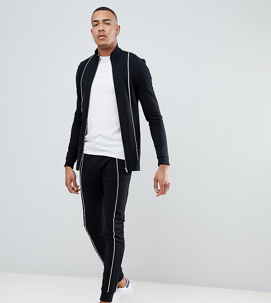 ASOS DESIGN Tall - Tuta attillata nera giacca e joggers super skinny con profili-Nero
