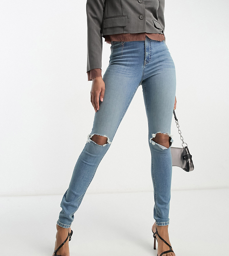 ASOS DESIGN Tall ultimate skinny jean in mid blue with knee rips
