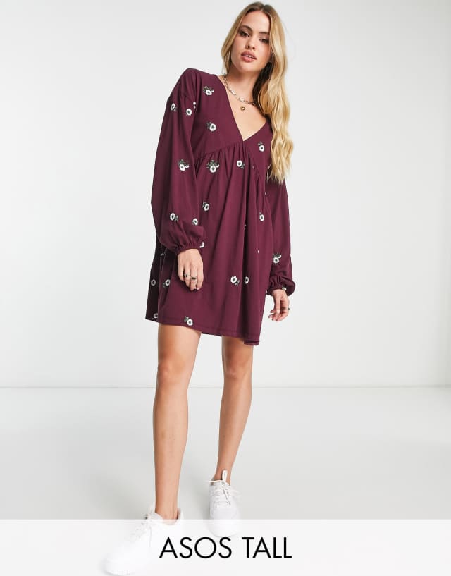 ASOS DESIGN Tall v neck smock mini dress with all over daisy embroidery in burgundy