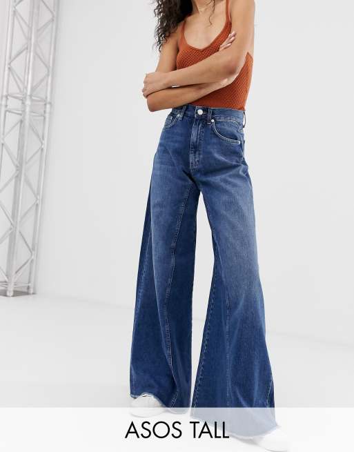 ASOS DESIGN Wide leg jeans with cinch waist detail in mid stone wash