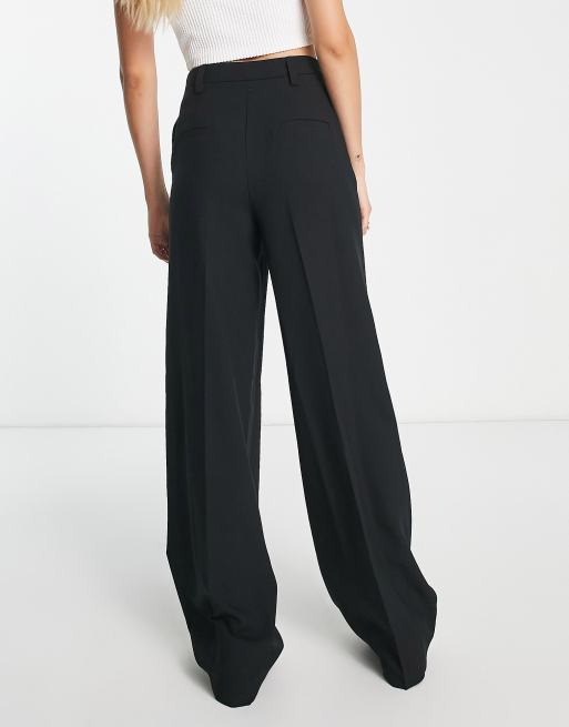 ASOS DESIGN wide leg disco pant with puddle hem in black