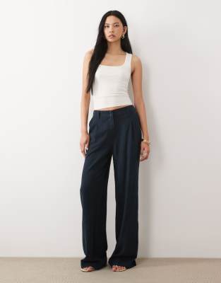 ASOS DESIGN Tall wide leg pants with pleat detail in linen blend in navy