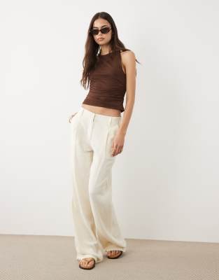 ASOS DESIGN Tall wide leg trousers with pleat detail in linen blend in cream-White