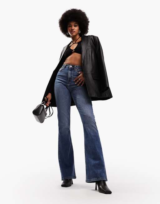 ASOS DESIGN Tall - Wijd uitlopende jeans met halfhoge taille in middenblauw, 3 van 5