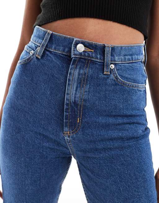 ASOS DESIGN Tall - Wijd uitlopende jeans met halfhoge taille in middenblauw, 2 van 5