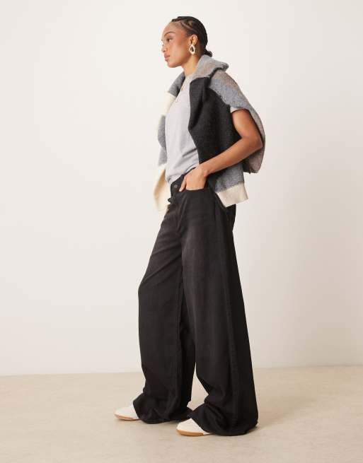 ASOS DESIGN Tall - Zachte jeans met wijde pijpen in zwart met wassing