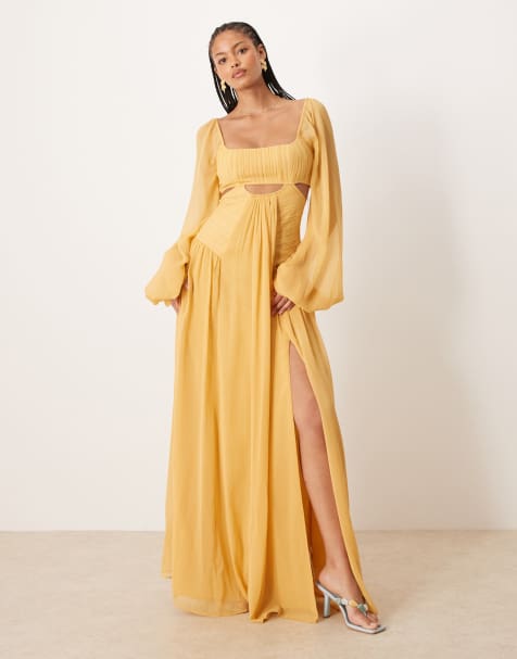 ASOS DESIGN Tall long sleeve cut out maxi dress with ruched skirt in mustard