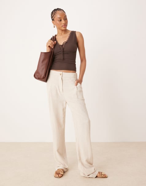 ASOS DESIGN Tall pleat front tapered trousers with linen in stone