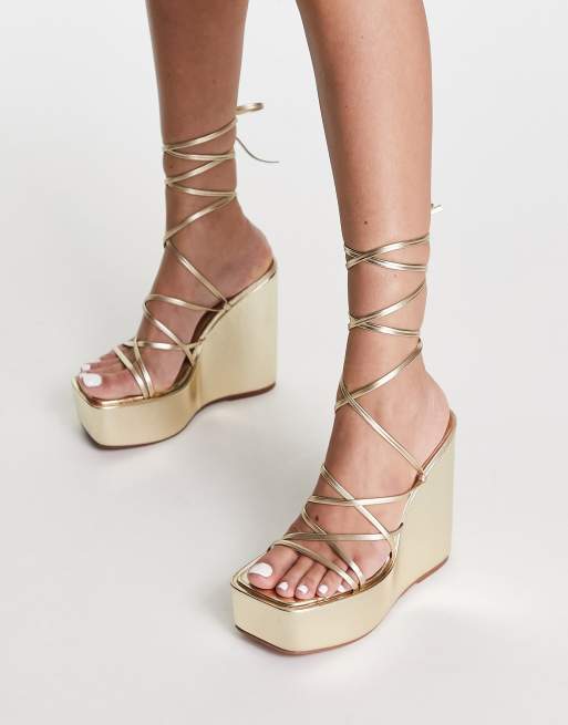 Asos design trophy tie leg sales high wedges