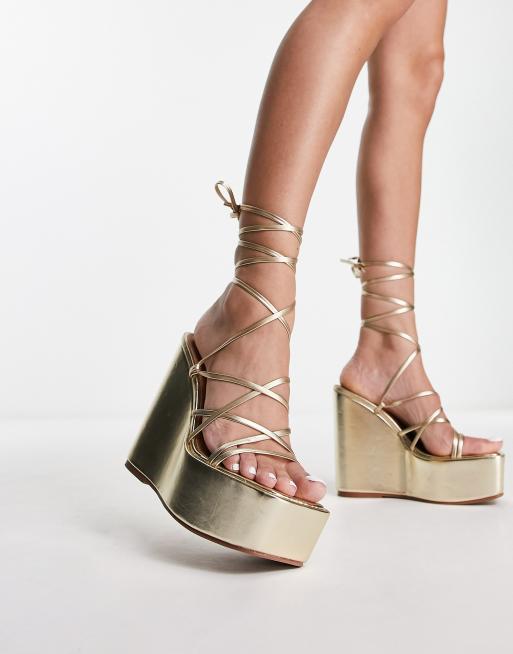 ASOS DESIGN Tanon tie leg wedges in gold