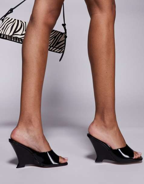ASOS DESIGN Tansi high heeled wedge mules in black - view 1