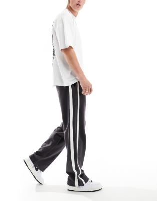 tape stripe wide leg sweatpants in black