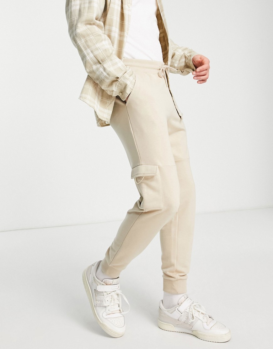 ASOS DESIGN tapered cargo joggers in beige-Neutral
