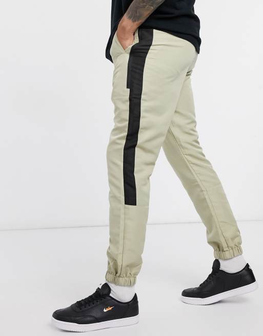 ASOS DESIGN tapered cargo joggers with elasticated waist in nylon ASOS