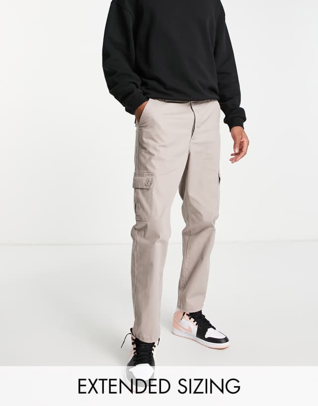 ASOS DESIGN tapered cargo pants in brown