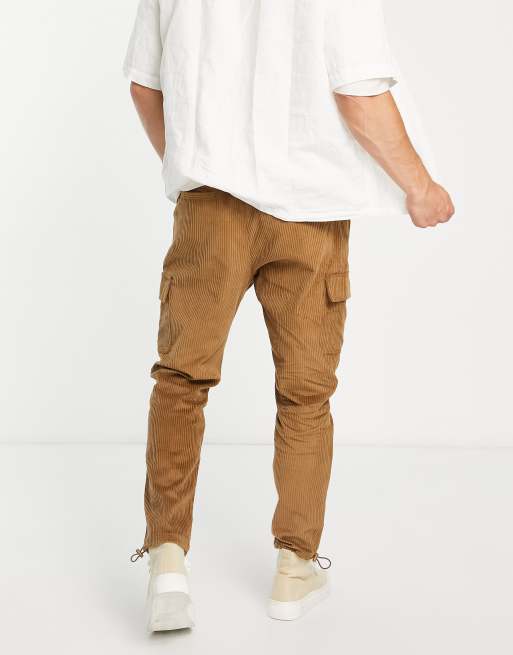 ASOS DESIGN tapered cargo pants in cord in brown