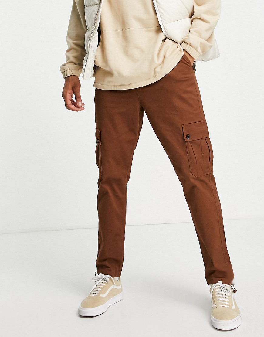 ASOS DESIGN tapered cargo pants in light brown with toggles
