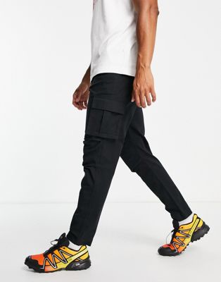 ASOS DESIGN tapered cargo trousers in black with 3D pockets - ASOS Price Checker