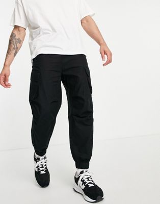 ASOS DESIGN tapered cargo trousers in black