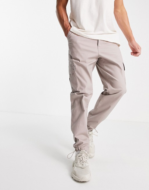 ASOS DESIGN tapered cargo trousers in brown
