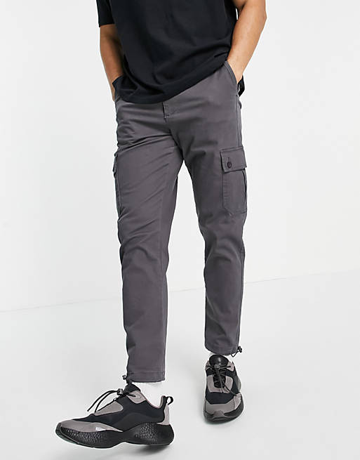 ASOS DESIGN tapered cargo trousers in charcoal with toggles