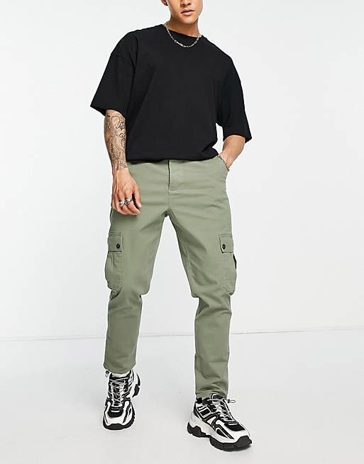 ASOS DESIGN tapered cargo trousers in khaki with toggles