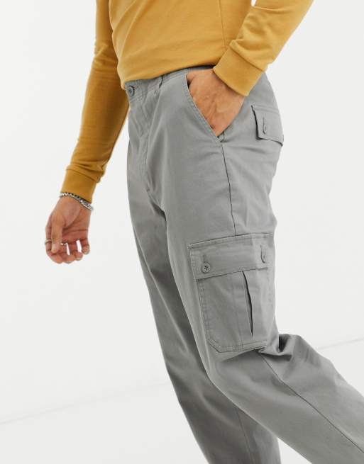 ASOS DESIGN tapered cargo trousers in khaki with toggles