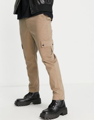 ASOS DESIGN tapered cargo trousers in light brown with toggles