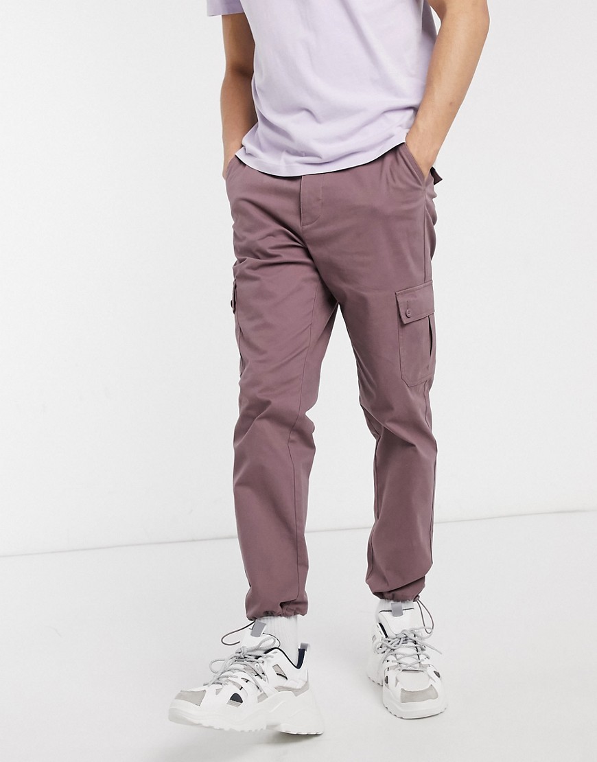 ASOS DESIGN tapered cargo trousers with toggles in washed purple