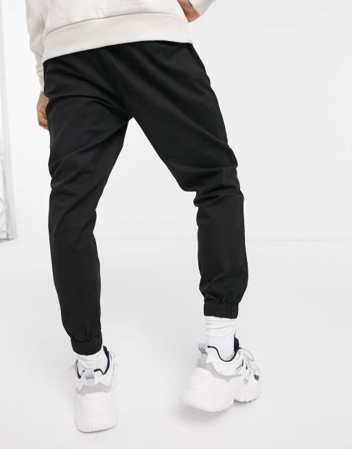 ASOS DESIGN tapered joggers in black