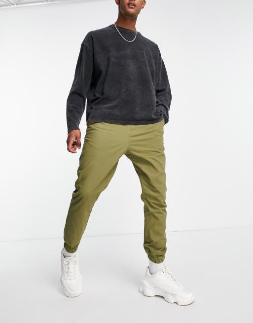 ASOS DESIGN tapered chino joggers with elasticated waist in khaki