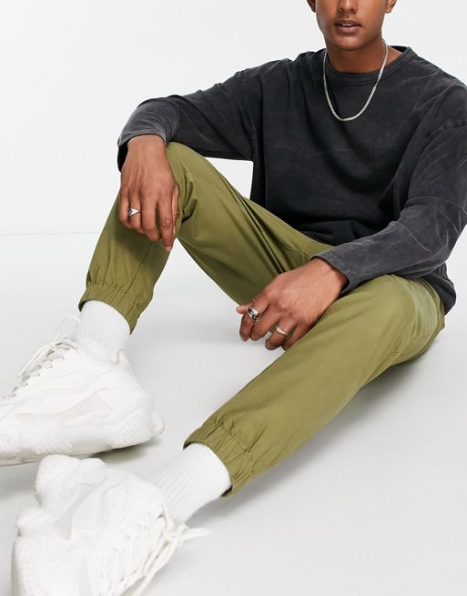 ASOS DESIGN tapered chino joggers with elasticated waist in khaki