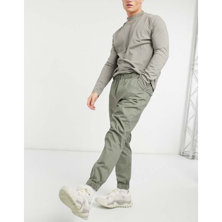 ASOS DESIGN tapered chino joggers with elasticated waist in khaki