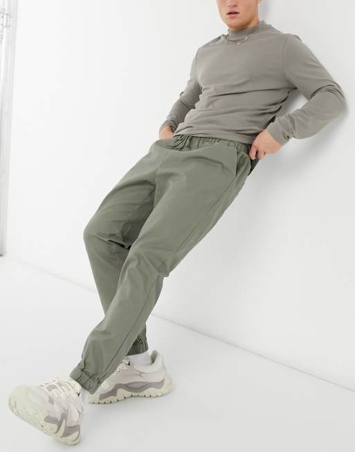 ASOS DESIGN tapered chino joggers with elasticated waist in khaki