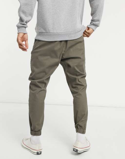 ASOS DESIGN tapered chino joggers with elasticated waist in khaki