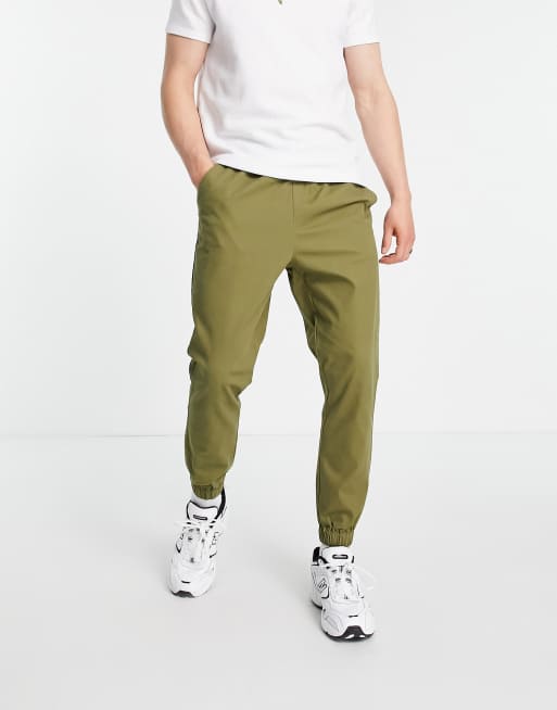 ASOS DESIGN tapered chino joggers with elasticated waist in khaki ASOS