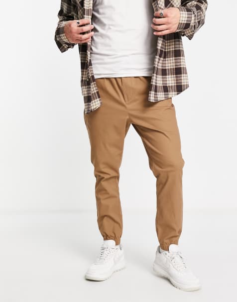 ASOS DESIGN tapered chino joggers with elasticated waist in stone - view 1