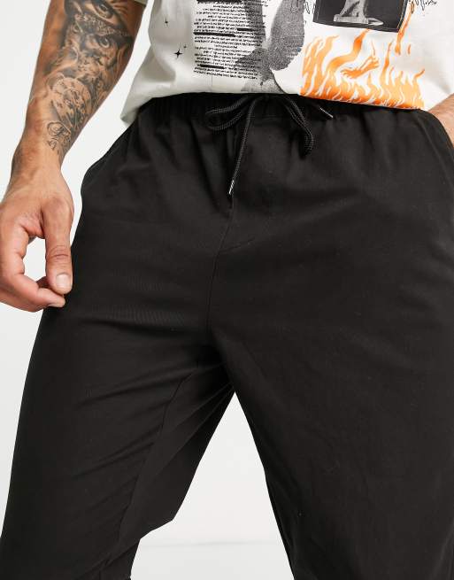 ASOS DESIGN - Tapered chino-joggingbukser med elastisk talje i sort, 3 af 4